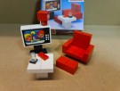 274 - Colour T.V and chair fra 1974 thumbnail