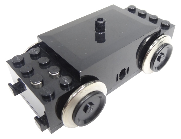 Electric, Train Motor 9V with Wheels
Testet og fungerer. Pin på toppen er skadet. Ingen praktisk betydning for tog som ikke bruker denne.