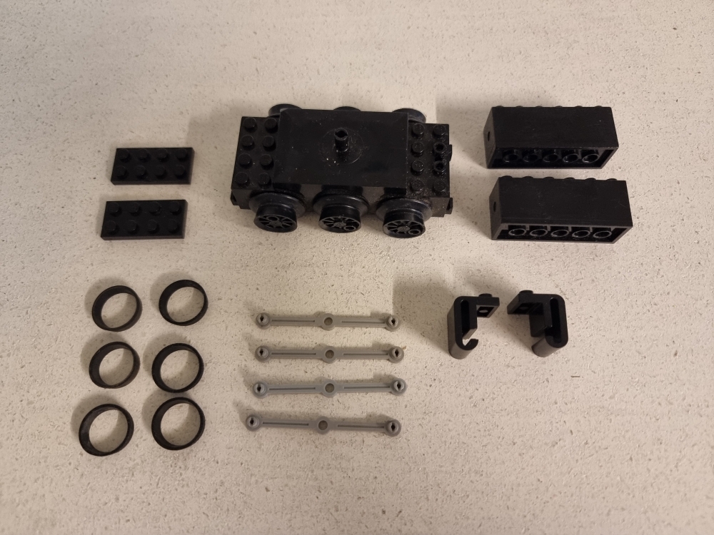 Sett 7865 fra Lego Train : 12V serien.
I god stand. 
Sorte gummiringer i stede for grå.